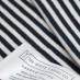 organic cotton label on navy pinstripe cotton